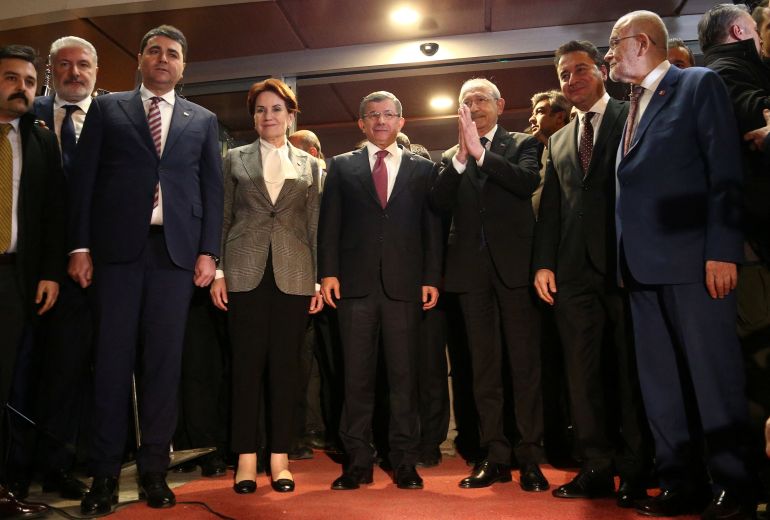 Leaders of the six-party opposition alliance, Gultekin Uysal of Democratic Party, Meral Aksener of IYI Party, Ahmet Davutoglu of Gelecek (Future) Party, Kemal Kilicdaroglu of Republican People's Party (CHP), Ali Babacan of DEVA Party and Temel Karamollaoglu of Felicity Party pose following their meeting in Ankara, Turkey March 6, 2023. REUTERS/Cagla Gurdogan