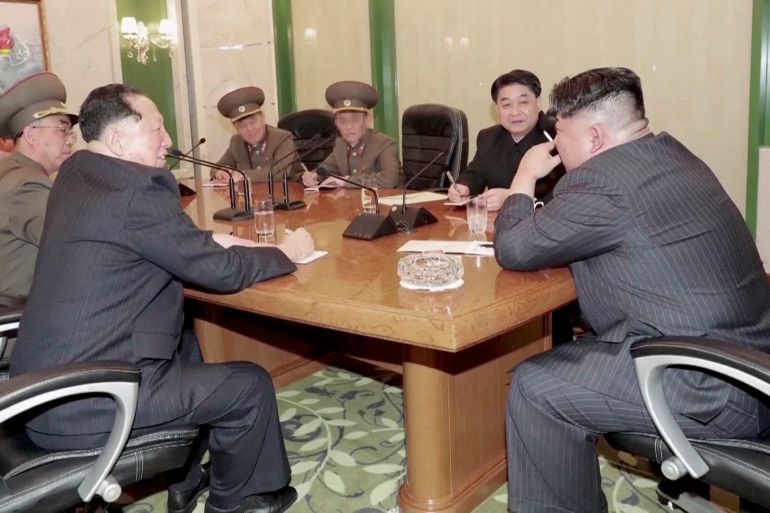 North Korean leader Kim Jong Un speaks with officials at an undisclosed location A screen grab shows North Korean leader Kim Jong Un speaking with officials at an undisclosed location in this undated still image used in a video. KRT/via Reuters TV/Handout via REUTERS THIS IMAGE HAS BEEN SUPPLIED BY A THIRD PARTY. NORTH KOREA OUT. NO COMMERCIAL OR EDITORIAL SALES IN NORTH KOREA DATE 28/03/2023 SIZE 2560 x 1440 SOURCE REUTERS/Handout .