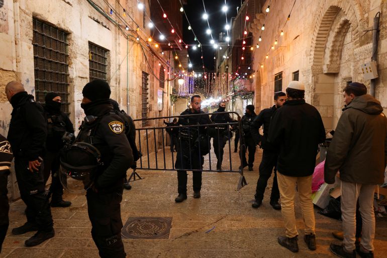 Israeli police stand guard near a security incident scene, in Jerusalem's Old City