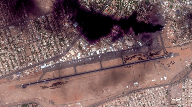 Satellite image shows smoke and an overview of Khartoum International Airport in Khartoum, Sudan April 16, 2023, in this handout image. Courtesy of Maxar Technologies/Handout via REUTERS. THIS IMAGE HAS BEEN SUPPLIED BY A THIRD PARTY. NO RESALES. NO ARCHIVES. MANDATORY CREDIT. MUST NO OBSCURE LOGO
