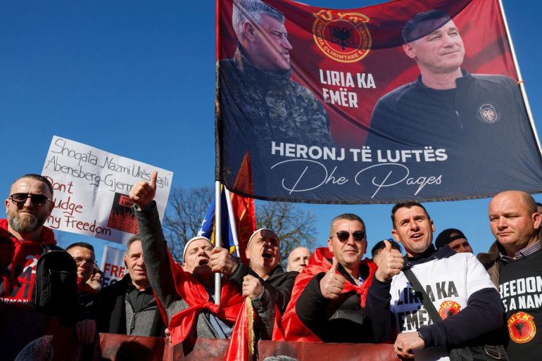 Supporters of former Kosovo President Hashim Thaci protest on the first day of his war crimes trial, in The Hague, Netherlands, April 3, 2023. REUTERS/Piroschka van de Wouw