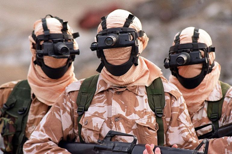 HERTFORDSHIRE - SEPTEMBER: Serving members of the Elite SAS regiment in a reconstruction filmed at a cement works in Hertfordshire, UK, for a drama programme based on the Iranian embassy seige, September 2000. (Photo by John Rogers/Getty Images)