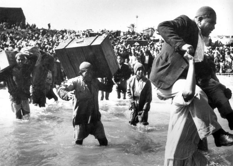 The 1948 Palestinian exodus, known in Arabic as the Nakba (Arabic: an-Nakbah, lit.'catastrophe'), occurred when more than 700,000 Palestinian Arabs fled or were expelled from their homes, during the 1947Ð1948 Civil War in Mandatory Palestine and the 1948 ArabÐIsraeli War. The exact number of refugees is a matter of dispute, but around 80 percent of the Arab inhabitants of what became Israel (50 percent of the Arab total of Mandatory Palestine) left or were expelled from their homes. Later in the war, Palestinians were forcibly expelled as part of 'Plan Dalet' in a policy of 'ethnic cleansing'. (Photo by: Pictures From History/Universal Images Group via Getty Images)
