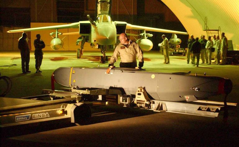 A STORM SHADOW MISSILE IS PREPARED FOR LOADING ON TO AN RAF TORNADO GR4 AIRCRAFT IN THE GULF.