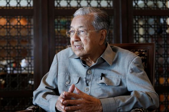 Former Malaysian Prime Minister Mahathir Mohamad speaks during an interview in Putrajaya