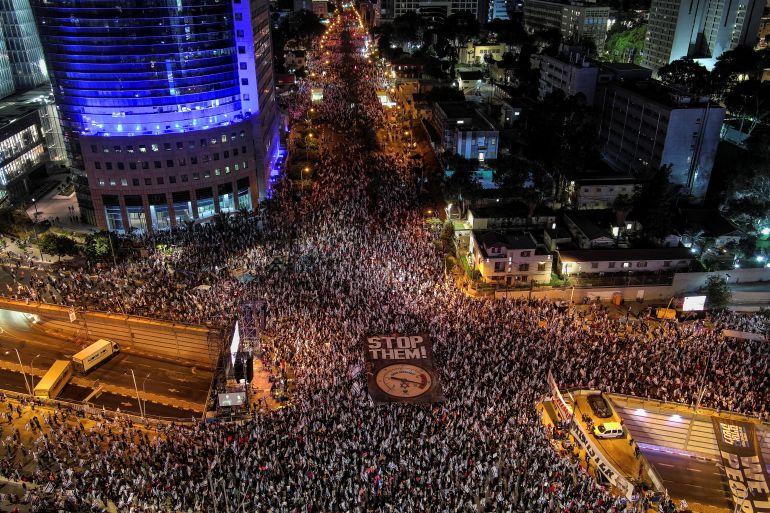 An aerial view shows protesters taking part in a demonstration against Israeli Prime Minister Benjamin Netanyahu and his nationalist coalition government's judicial overhaul, in Tel Aviv