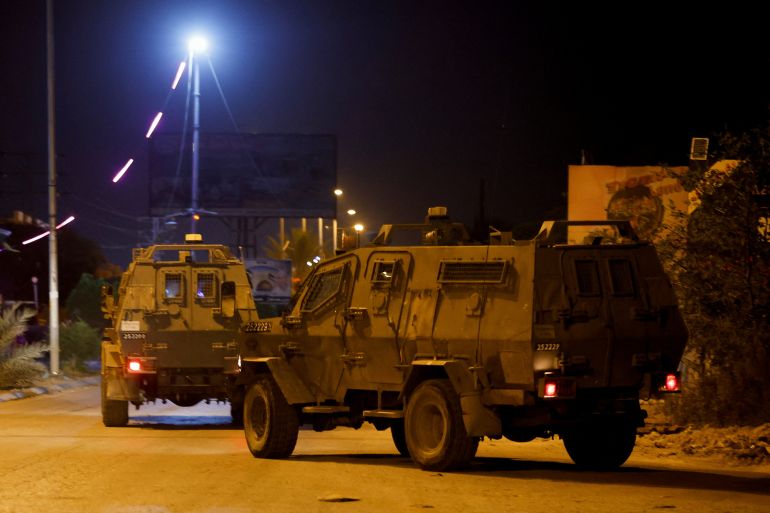 Israeli military vehicles operate in Jericho, in the Israeli-occupied West Bank