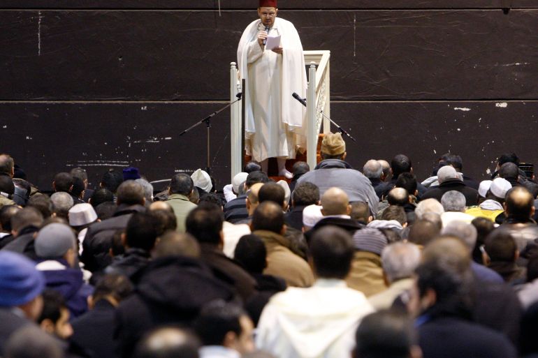Muslims pray in an exhibition hall used as a temporary mosque in Strasbourg