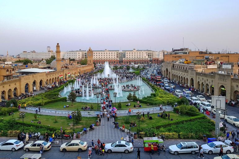 View of central square in Erbil which is bordered by the Qaysari Bazar and situated at the south of the citadel. Every evening a lot of people come to this place enjoying the fountains and having a drink or a sit or a stroll. gettyimages-1155732614