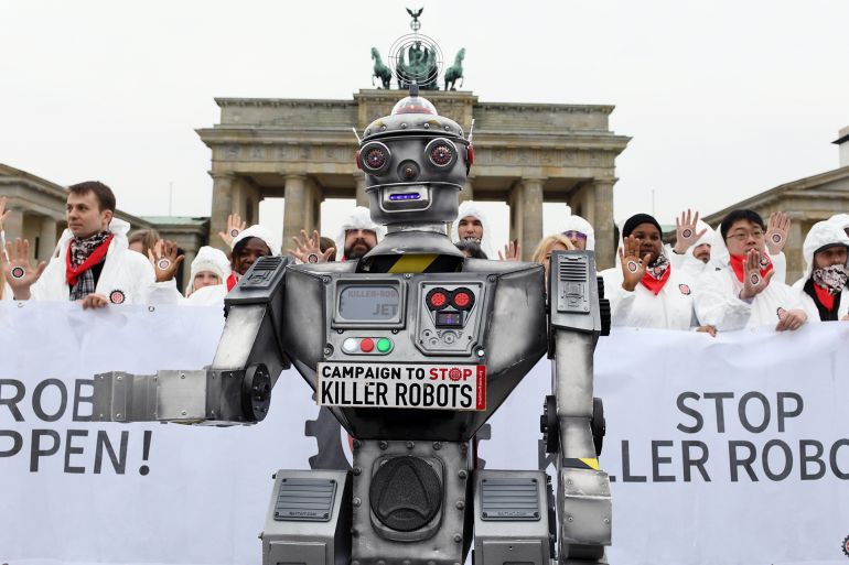 Activists from the Campaign to Stop Killer Robots, a coalition of non-governmental organisations opposing lethal autonomous weapons or so-called 'killer robots', stage a protest at Brandenburg Gate in Berlin, Germany, March, 21, 2019. REUTERS/Annegret Hilse