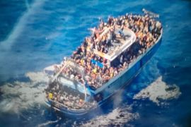 Rescued immigrants in Greece's Kalamata