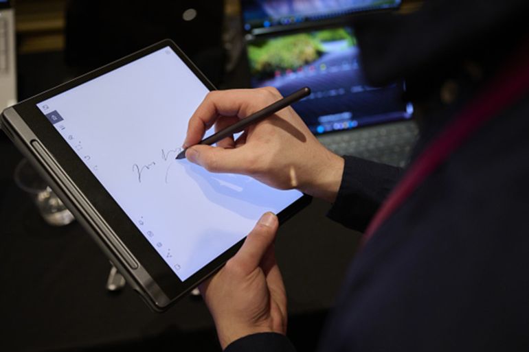 Smart Paper tablet by Lenovo Group Ltd. on during a press event at the 2023 CES event in Las Vegas, Nevada, US, on Wednesday, Jan. 4, 2023. For the first time, CES has a theme: how technology is addressing the world's biggest challenges. Photographer: Bridget Bennett/Bloomberg via Getty Images