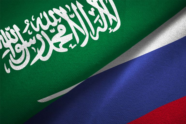 Russia and Saudi Arabia two flags together realations textile cloth fabric texture - stock photo Russia and Saudi Arabia flag together realtions textile cloth fabric texture GettyImages-1089002912