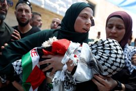 RAMALLAH, WEST BANK- JUNE 06: Palestinian women mourn as they attend the funeral ceremony of 2-year-old Mohammed et Tamimi, who killed by Israeli forces in the village of Nabi Saleh, northwest of Ramallah, West Bank on June 06, 2023. (Photo by Issam Rimawi/Anadolu Agency via Getty Images)