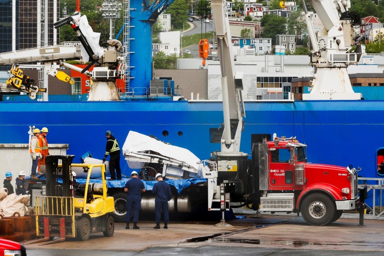 Salvaged pieces of Titan submersible from OceanGate Expeditions are returned, in St. John's harbour