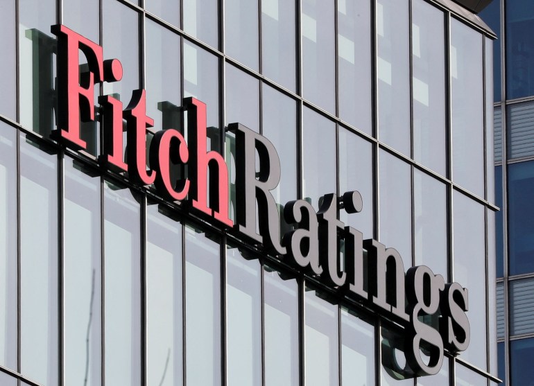 FILE PHOTO: FILE PHOTO: The Fitch Ratings logo is seen at their offices at Canary Wharf financial district in London