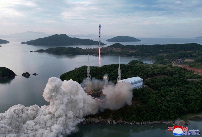 A still photograph shows what appears to be North Korea's new Chollima-1 rocket being launched in Cholsan County