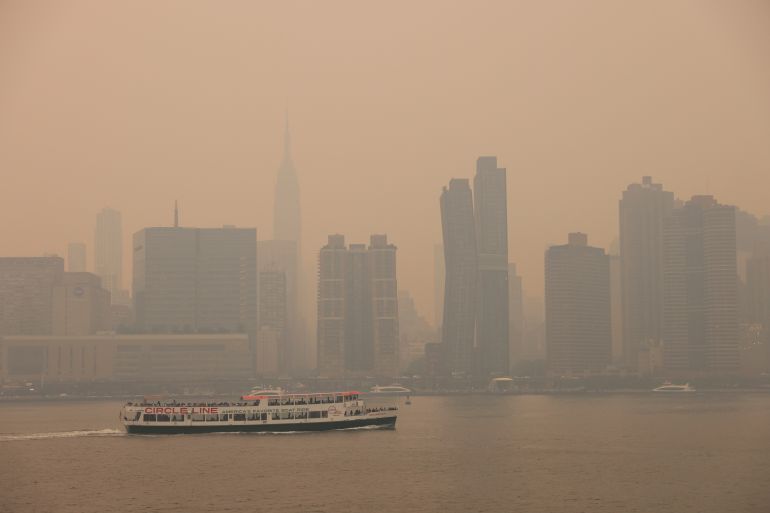 Haze and smoke caused by wildfires in Canada blanket New York City