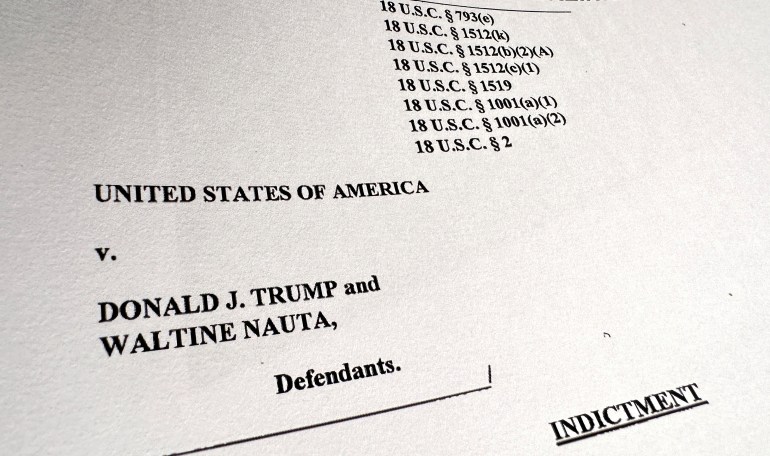 The charging document against former President Donald Trump is seen in Washington