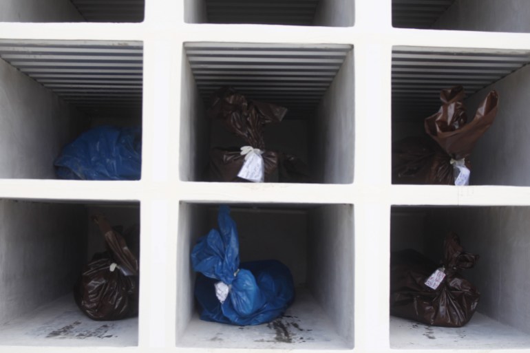 Bags containing unidentified bodies are seen at Memorial Los Angeles cemetery in Tegucigalpa, Honduras