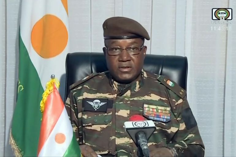 This video frame grab image obtained by AFP from ORTN - Télé Sahel on July 28, 2023 shows General Abdourahamane Tchiani, Nigers new strongman, speaking on national television and reads a statement as "President of the National Council for the Safeguarding of the Fatherland", after the ouster of President-elect Mohamed Bazoum. - The chief of the Presidential Guard justifies the coup by evoking "the continued deterioration of the security situation" in the country, as well as "poor economic and social governance". (Photo by - / ORTN - Télé Sahel / AFP)