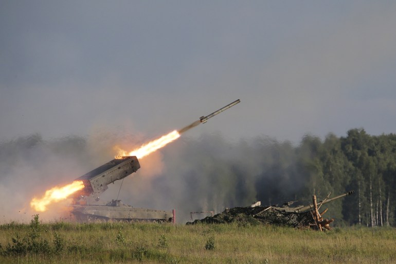 A Russian TOS-1A multiple rocket launcher fires during the opening of the Army-2015 international military forum in Kubinka, outside Moscow, Russia, June 16, 2015. REUTERS/Maxim Shemetov