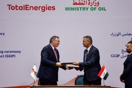 Iraqi Deputy Prime Minister for Energy Affairs and Minister of Oil, Hayan Abdul Ghani Al-Swad and Patrick Pouyanne, Chairman and CEO of TotalEnergies, attend a signing ceremony of the Gas Growth Integrated Project (GGIP) in Baghdad, Iraq, July 10, 2023. REUTERS/Thaier Al-Sudani