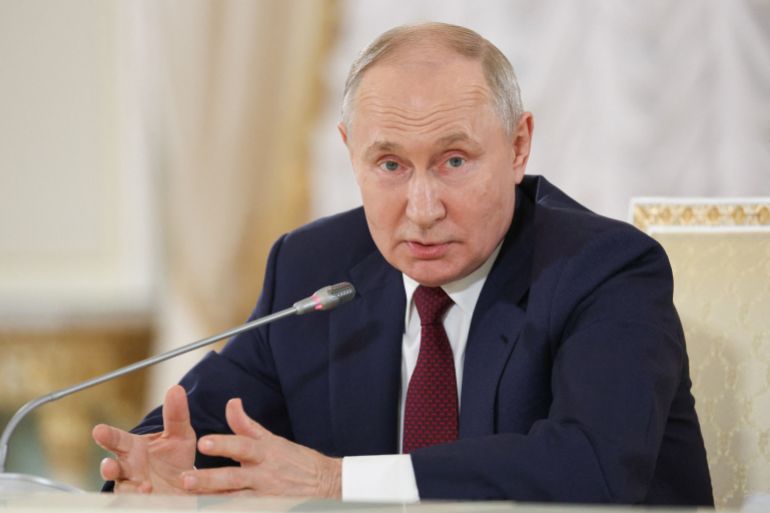 Russia's President Putin attends a press conference in St Petersburg