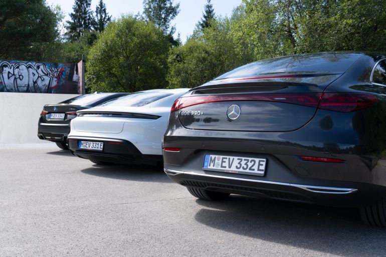 Krailling, Germany 09 06 2022: Porsche Taycan 4S, BMW i4 M50 and a Mercedes Benz EQE 350+ parked next ...