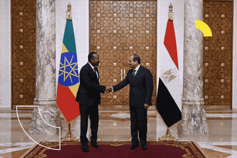 Egyptian President Abdel Fattah al-Sisi shakes hands with Ethiopian Prime Minister Abiy Ahmed after their meeting to discuss Sudan's crisis and Ethiopian dam, at the Ittihadiya presidential palace in Cairo, Egypt, July 13, 2023. The Egyptian Presidency/Handout via REUTERS ATTENTION EDITORS - THIS IMAGE WAS PROVIDED BY A THIRD PARTY.