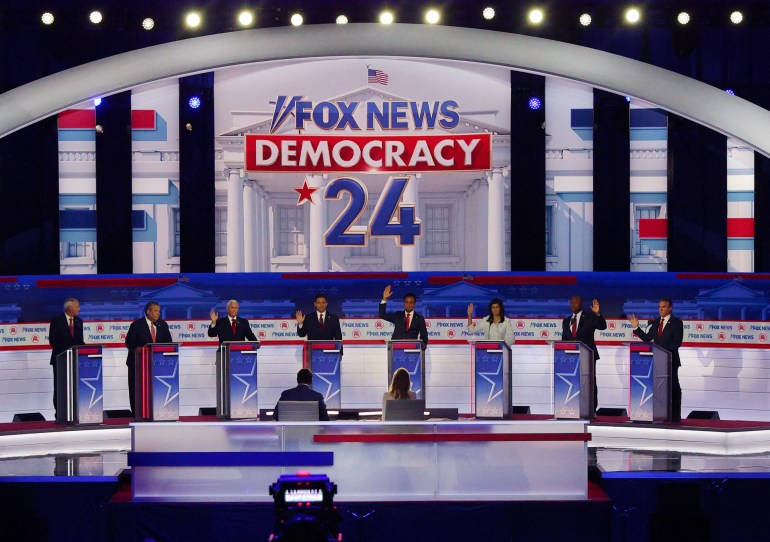 Six of the eight Republican presidential contenders on the debate stage indicate that they would support Donald Trump as their party's 2024 White House nominee even if he is convicted of a crime at the first Republican candidates' debate of the 2024 U.S. presidential campaign in Milwaukee, Wisconsin, U.S. August 23, 2023. REUTERS/Brian Snyder