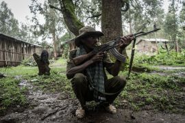 An Amhara militia member poses fro a photograph near the village of Chenna, 95 kilometres northeast of the city of Gondar, Ethiopia, on September 14, 2021. (Photo by Amanuel Sileshi / AFP)