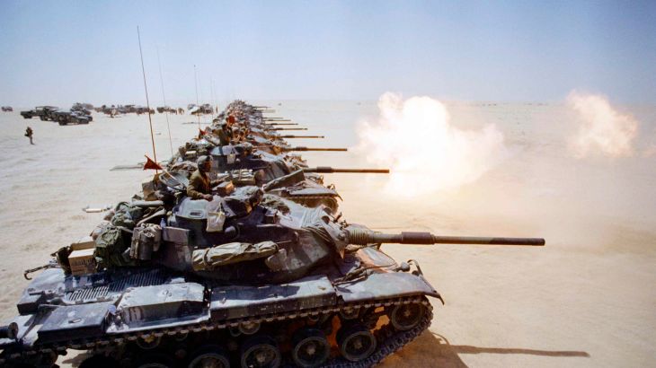 After weeks of waiting, a column of U.S Marine Corps M-60 tanks began firing live ammunition in the Saudi desert on Friday, Sept. 14, 1990 in Saudi Arabia. Delayed because of sensitivities of the Saudi government, American military commanders insisted live firing exercises are essential for calibrating and accurizing gun sights. (AP Photo/Tannen Maury)