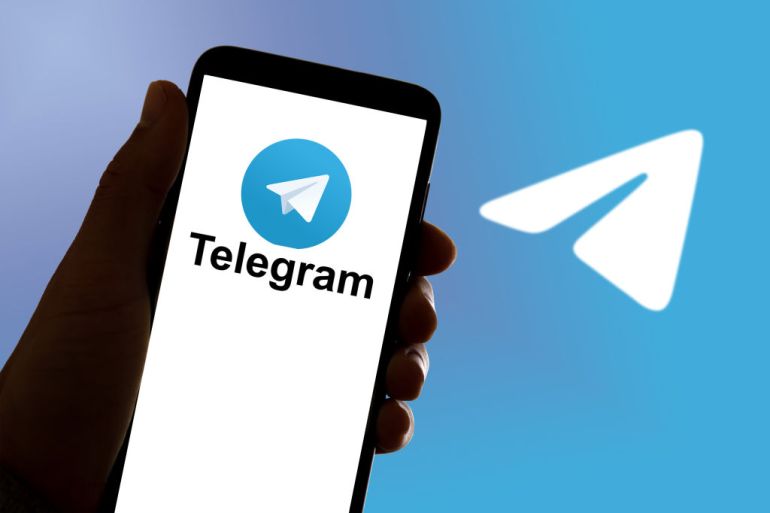 SPAIN - 2022/10/17: In this photo illustration, the online chat and communication app Signal Telegram logo seen displayed on a mobile phone and on a laptop. (Photo Illustration by Davide Bonaldo/SOPA Images/LightRocket via Getty Images)