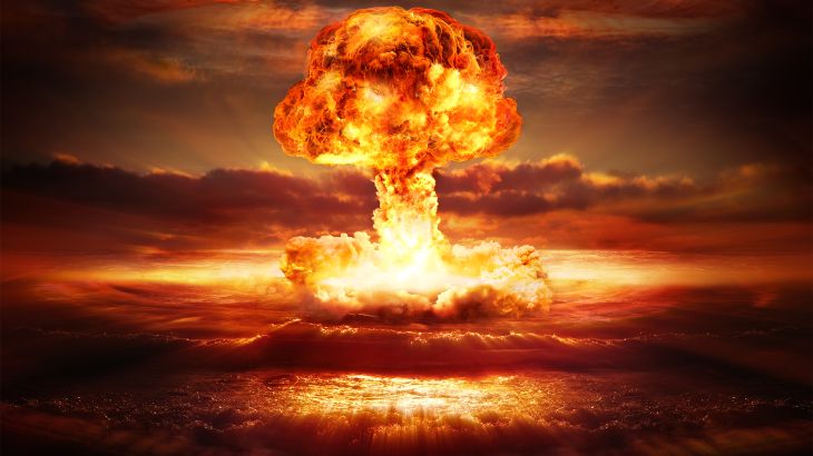 Explosion nuclear bomb in ocean - stock photo testing of atomic bomb over ocean with mushroom clouds - red destroy