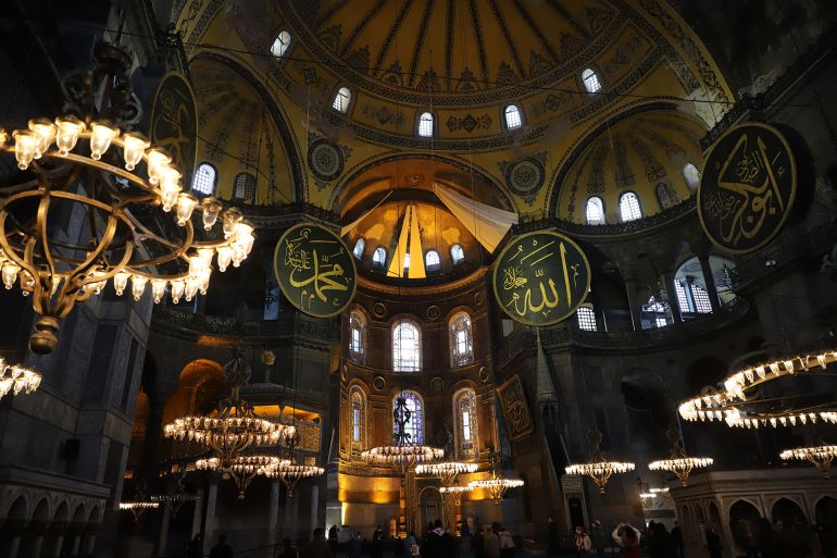 ISTANBUL, TURKEY - MARCH 01, 2021: People visit Hagia Sophia Mosque. It was converted into mosque in 2019; Shutterstock ID 1945308841; purchase_order:ajm; job:elhakeemelagouzk; client:; other: