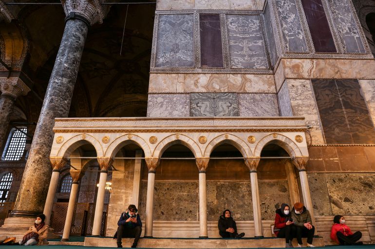 People rest at the Ayasofya-i Kebir Camii or Hagia Sophia Grand Mosque in Istanbul, Turkey, January 21, 2022. REUTERS/Umit Bektas