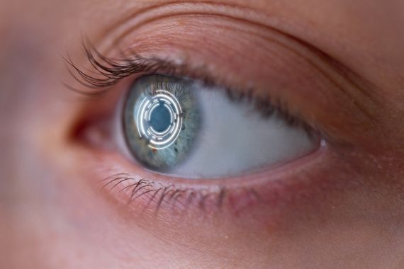 Woman's eye with smart contact lens with digital and biometric implants to scan the ocular retina close up. Concept of future and technology for digital scans; Shutterstock ID 1404253814; purchase_order: AJA; job: ; client: ; other: