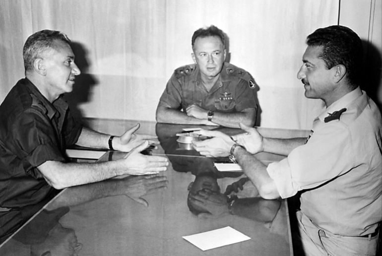 L-R: Israeli General Haïm Bar-Lev, the deputy chief-of-staff of the Israeli army, General Yitzhak Rabin, chief-of-staff and General Ezer Weizman during a meeting 06 June 1967 at the beginning of the third Israeli-Arab war. On 05 June 1967, Israel launched preemptive attacks against Egypt and Syria. In just six days, Israel occupied the Gaza Strip and the Sinai peninsula of Egypt, the Golan Heights of Syria, and the West Bank and Arab sector of East Jerusalem (both under Jordanian rule), thereby giving the conflict the name of the Six-Day War. (Photo by AFP FILES / AFP)