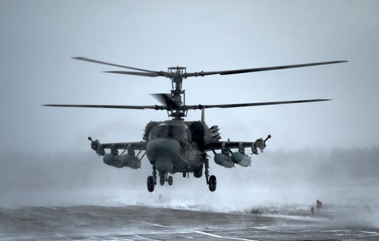 A Ka-52 "Alligator" reconnaissance and attack helicopter is seen during flight testing conducted by the Russian Air Force of the Southern Military District at a military aerodrome in the Rostov region, Russia January 19, 2022. REUTERS/Sergey Pivovarov