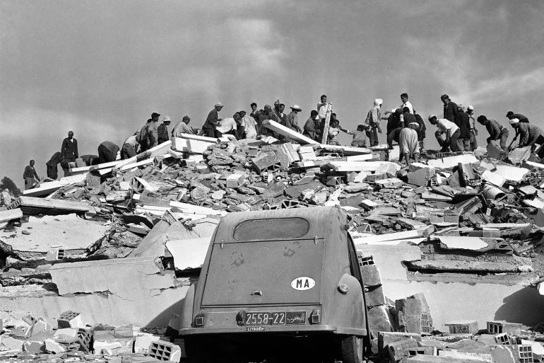 A violent earthquake has destroyed mostly all the southern Moroccan port of Agadir, March 2, 1960. Building and houses have collapsed and first reports say that several thousands of persons have been killed or wounded. Here is a 2CV-Citroen car under a collapsed house in Agadir, Morocco. (AP Photo)
