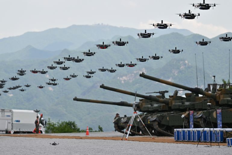 South Korea's military drones fly in formation during a South Korea-US joint military drill at Seungjin Fire Training Field in Pocheon on May 25, 2023. (Photo by Yelim LEE / AFP)