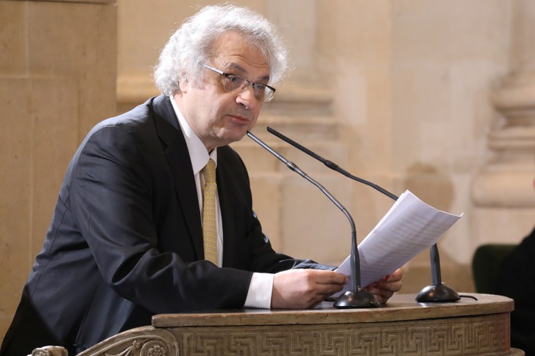 French writer and academician Amin Maalouf speaks during a ceremony at the French Institute, after France's President Emmanuel Macron unveiled, before members of the French Academy and other guests, his strategy to promote French language as part of the International Francophonie Day, in Paris, France, March 20, 2018. Ludovic Marin/Pool via REUTERS