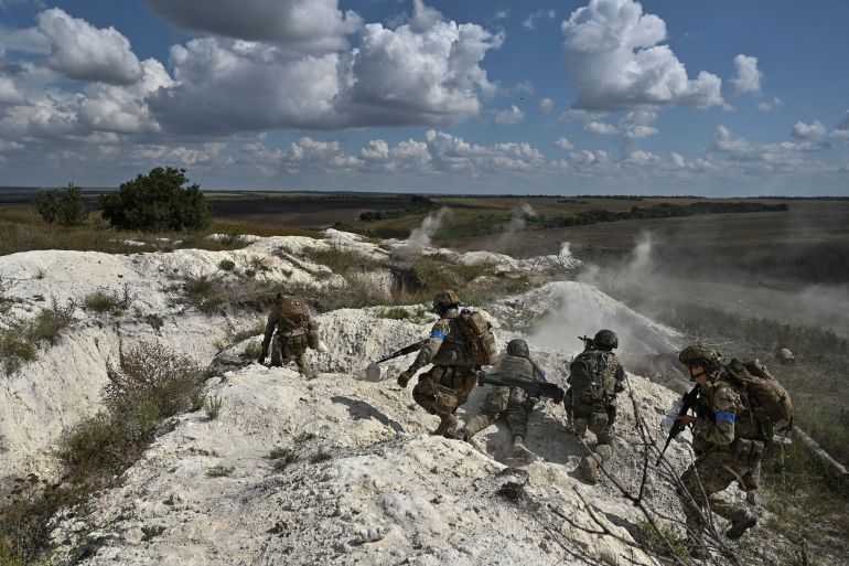 Ukrainian service members attend military exercises near Bakhmut
