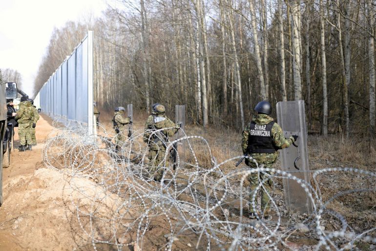 FILE PHOTO: Construction site of a barrier at the border between Poland and Belarus