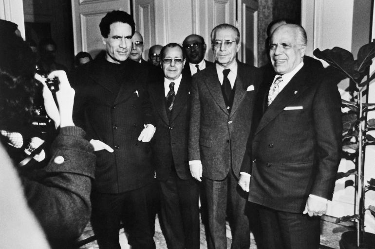 (Archive) A picture taken in Geneva on January 25, 1974 shows Colonel Moamer Kadhafi (L), leader of the Libyan Jamahiriya, and Habib Bourguiba, President of Tunisia (R), Hedi Nouira (2nd R), Tunisian Prime Minister, and Habib Chatti (2nd L), Tunisian Foreign Minister. AFP PHOTO (Photo by AFP) (Photo by -/AFP via Getty Images)