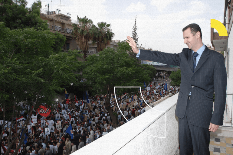 Syrian president Bashar Al Assad salutes demonstrators from the balcony of his office in Damascus, Syria on May 29, 2007, after he was widely reelected with a result of 97,62 % in a referendum where he was the only candidate.