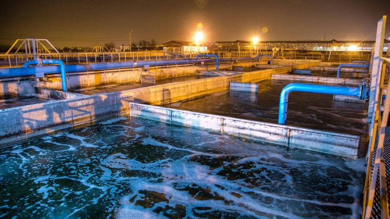Sewage treatment plant at night.  |  Image: Courtesy of Getty Images