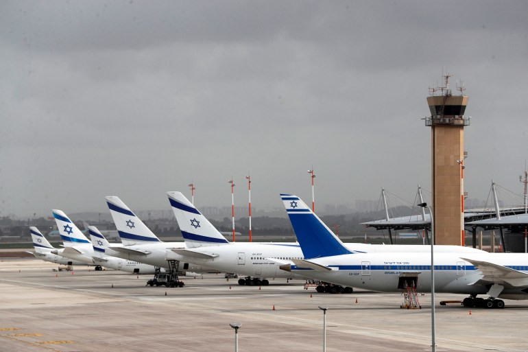 FILE PHOTO: El Al Israel Airlines planes are seen on the tarmac at Ben Gurion International airport in Lod, near Tel Aviv, Israel March 10, 2020. REUTERS/Ronen Zvulun/File Photo