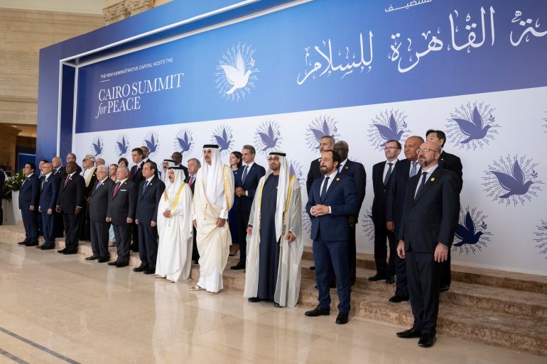 Sheikh Mohamed bin Zayed Al Nahyan, President of the United Arab Emirates stands for a photograph, during the Cairo Summit for Peace, with Charles Michel, President of the European Council, HE Nikos Christodoulides, President of Cyprus, Sheikh Tamim bin Hamad Al Thani, Emir of Qatar, King Hamad bin Isa Al Khalifa, King of Bahrain, Abdel Fattah El Sisi, President of Egypt , King Abdullah II, King of Jordan, Mahmoud Abbas, President of Palestine, Cyril Ramaphosa, President of South Africa, Mohamed Ould Ghazouani, President of Mauritania, Mohamed Al Menfi, Chairman of the Presidential Council of the State of Libya at the St. Regis, in Cairo, Egypt, October 21, 2023. UAE Presidential Court/ Abdulla Al Neyadi/Handout via REUTERS THIS IMAGE HAS BEEN SUPPLIED BY A THIRD PARTY